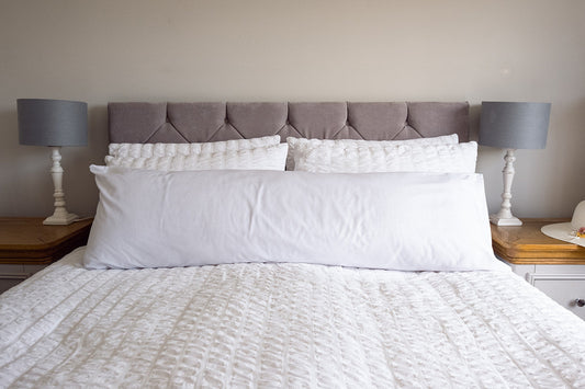 7 Ways to Style Bolster Pillows on Your Bed